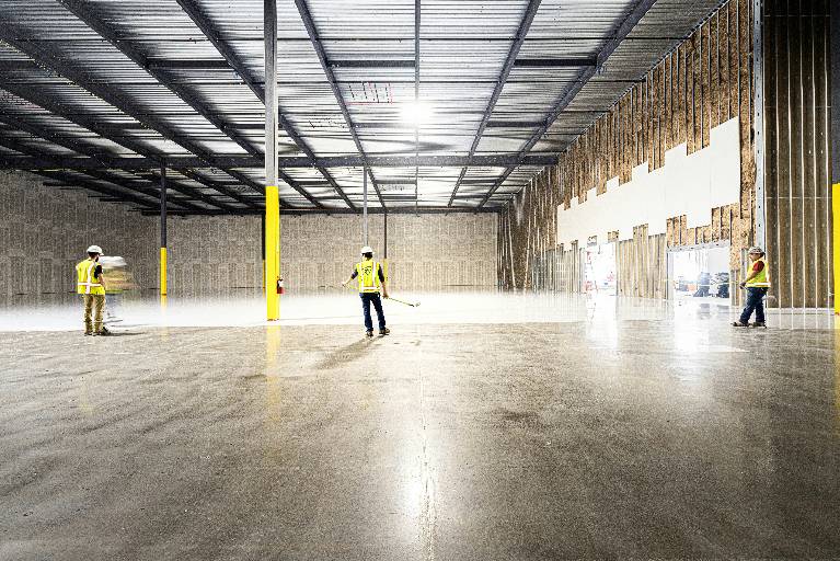 Warehouse floor cleaning in a large industrial space